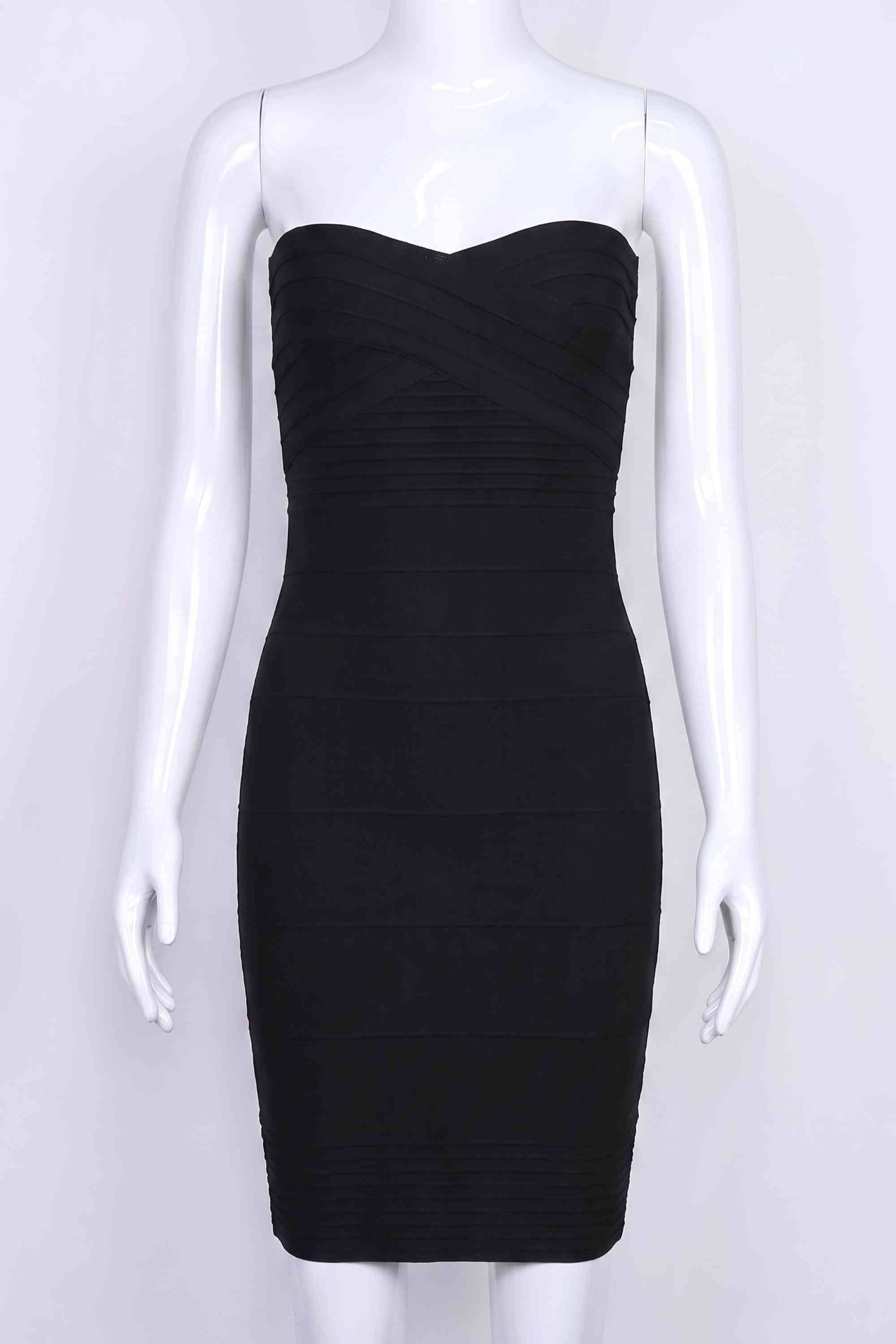 Woman wearing a figure flattering Aaliyah Bandage Mini Dress - Classic Black BODYCON COLLECTION