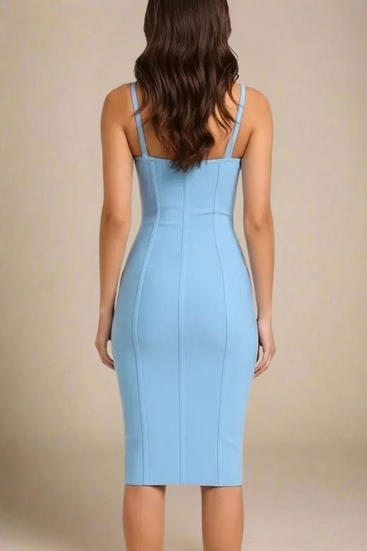 Woman wearing a figure flattering Abi Bandage Dress - Sky Blue Bodycon Collection