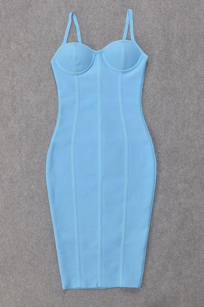 Woman wearing a figure flattering Abi Bandage Dress - Sky Blue Bodycon Collection