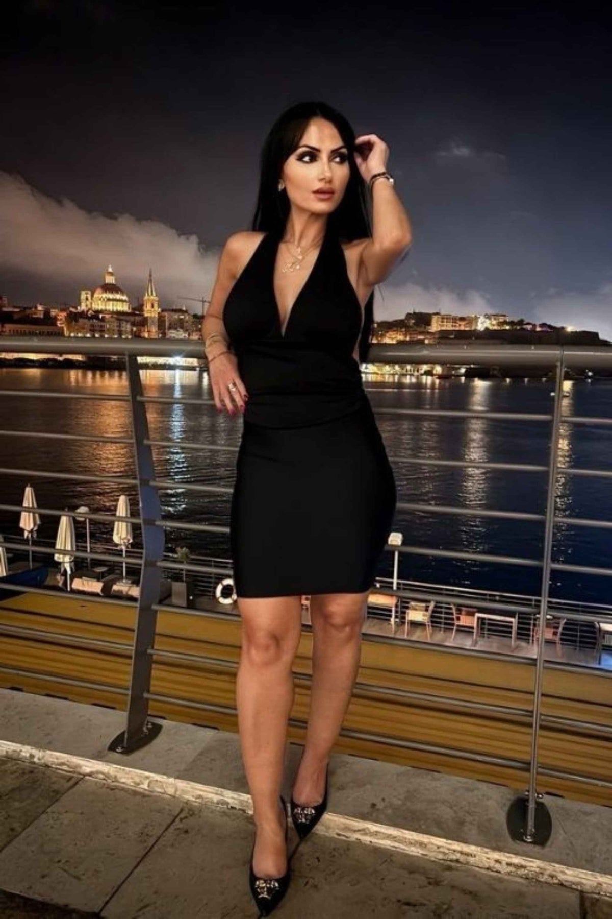 Woman wearing a figure flattering Aby Halter Neck Top - White Pearl BODYCON COLLECTION Pty Ltd