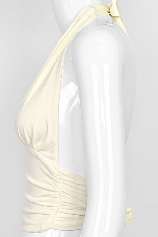 Woman wearing a figure flattering Aby Halter Top - Butter Yellow BODYCON COLLECTION Pty Ltd