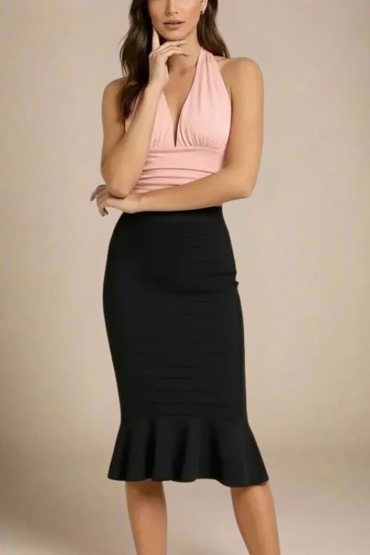 Woman wearing a figure flattering Aby Halter Top - Pink Peach Fuzz BODYCON COLLECTION Pty Ltd
