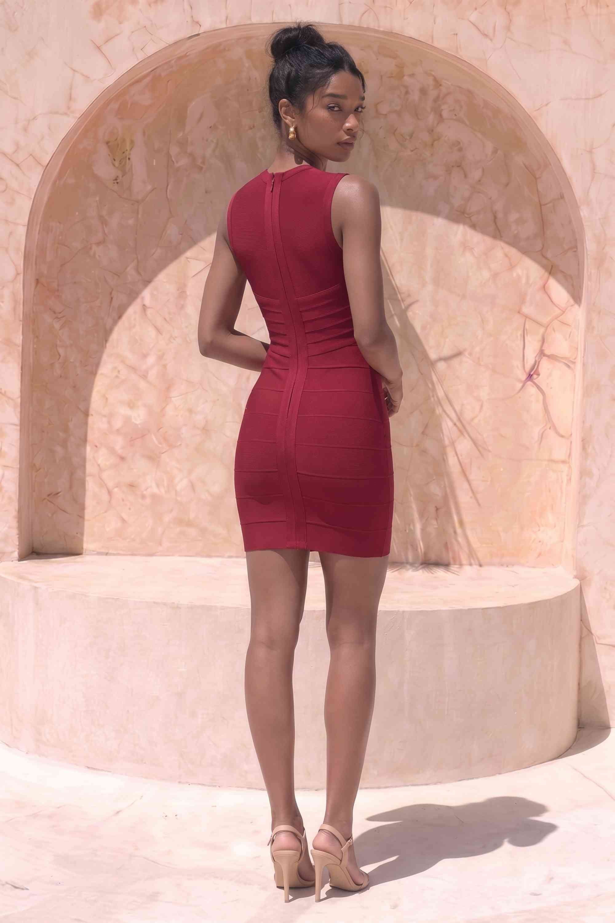 Woman wearing a figure flattering Alora Bandage Mini Dress - Red Wine BODYCON COLLECTION Pty Ltd