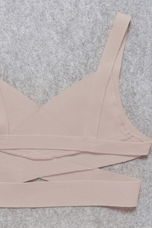 Woman wearing a figure flattering Ang Bandage Crop Top - Cream BODYCON COLLECTION