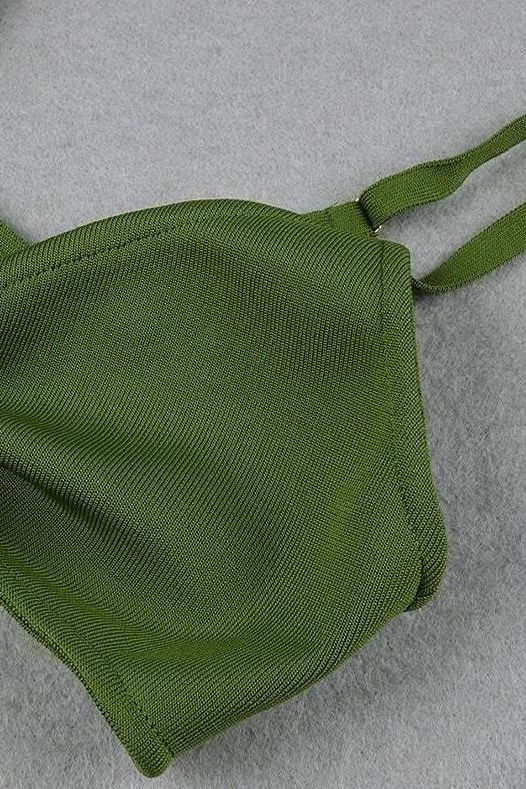 Woman wearing a figure flattering  Aria Bodycon Day Maxi Dress - Emerald Green BODYCON COLLECTION