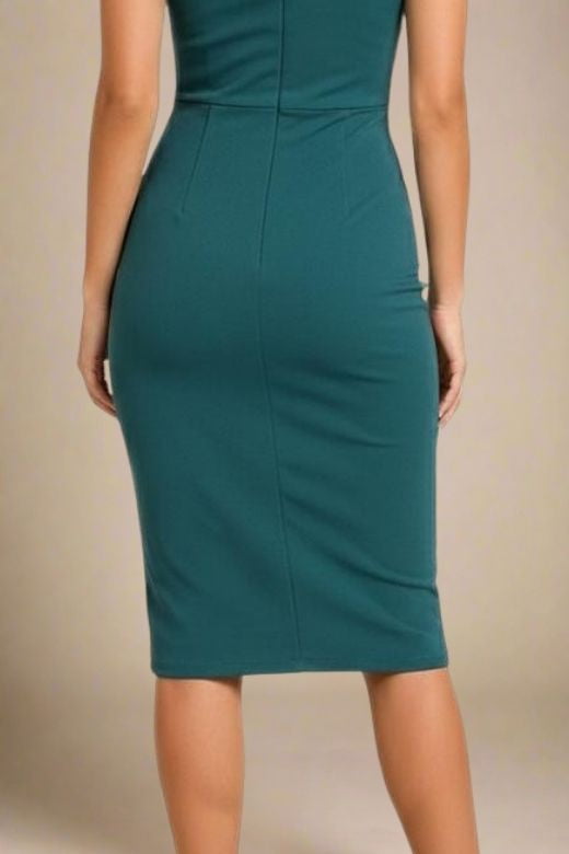 Woman wearing a figure flattering Ash Bandage Dress - Emerald Green Bodycon Collection