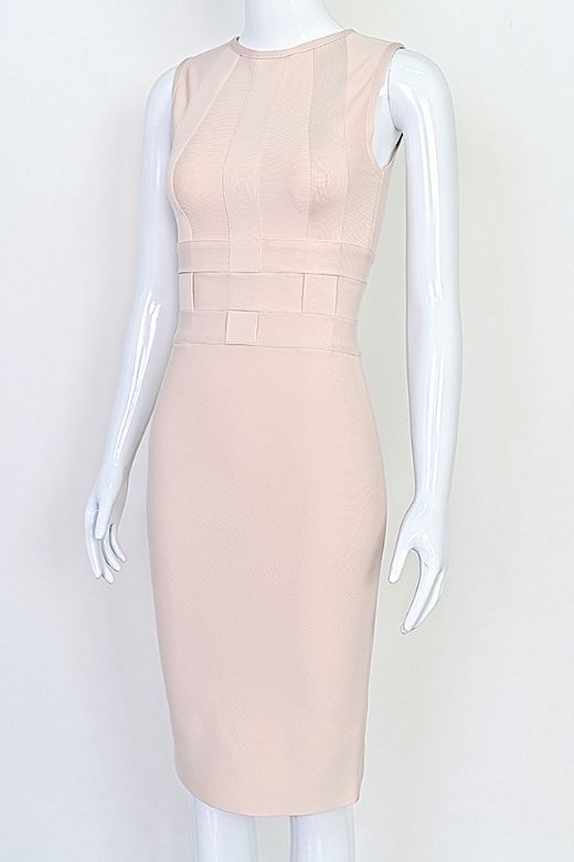 Woman wearing a figure flattering Aurora Bandage Dress - Cream BODYCON COLLECTION Pty Ltd