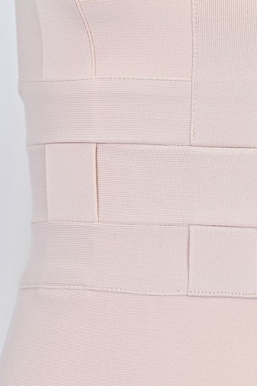 Woman wearing a figure flattering Aurora Bandage Dress - Cream BODYCON COLLECTION Pty Ltd