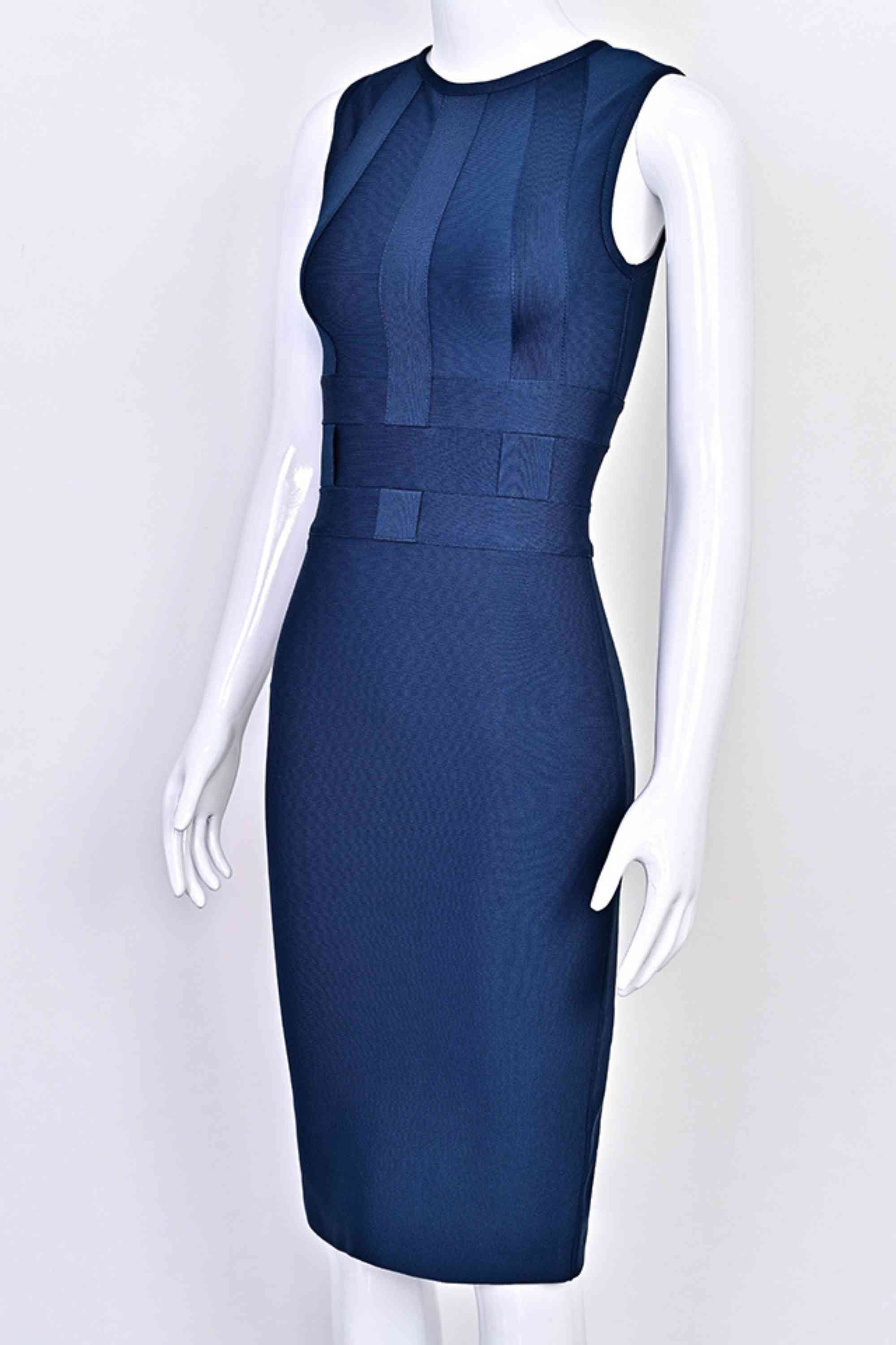 Woman wearing a figure flattering Aurora Bandage Dress - Navy Blue BODYCON COLLECTION Pty Ltd