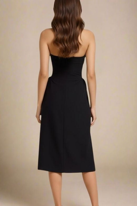 Woman wearing a figure flattering Austen Bodycon Midi Dress - Classic Black BODYCON COLLECTION