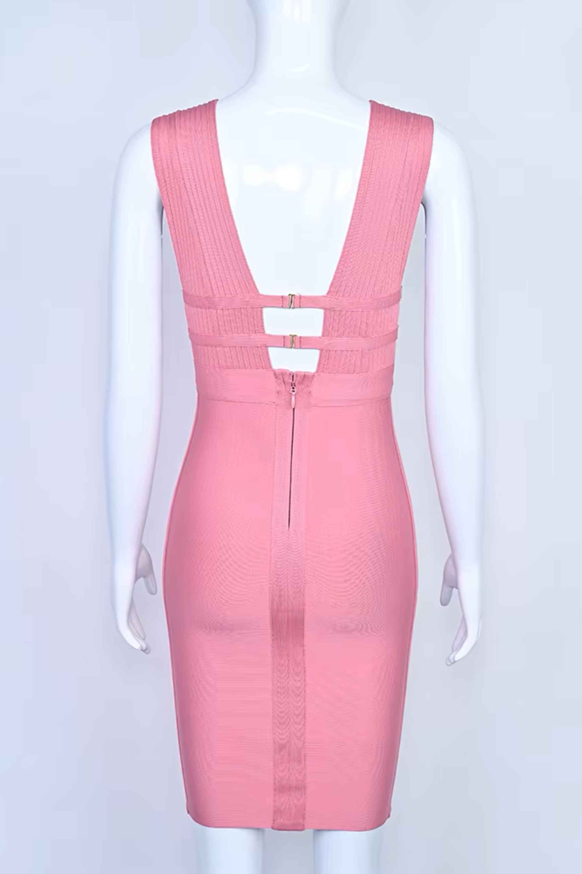 Woman wearing a figure flattering Bay Bandage Dress - Ballet Pink Bodycon Collection