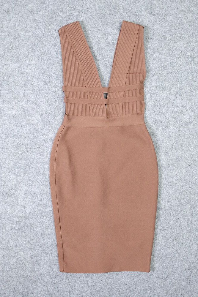 Woman wearing a figure flattering  Bay Bandage Dress - Nude Bodycon Collection