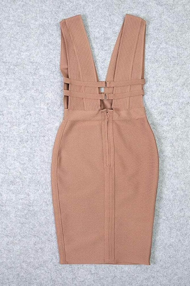 Woman wearing a figure flattering  Bay Bandage Dress - Nude Bodycon Collection