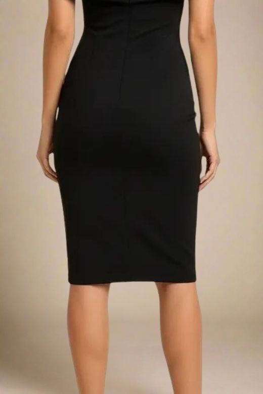 Woman wearing a figure flattering Bea Bandage Dress - Classic Black Bodycon Collection
