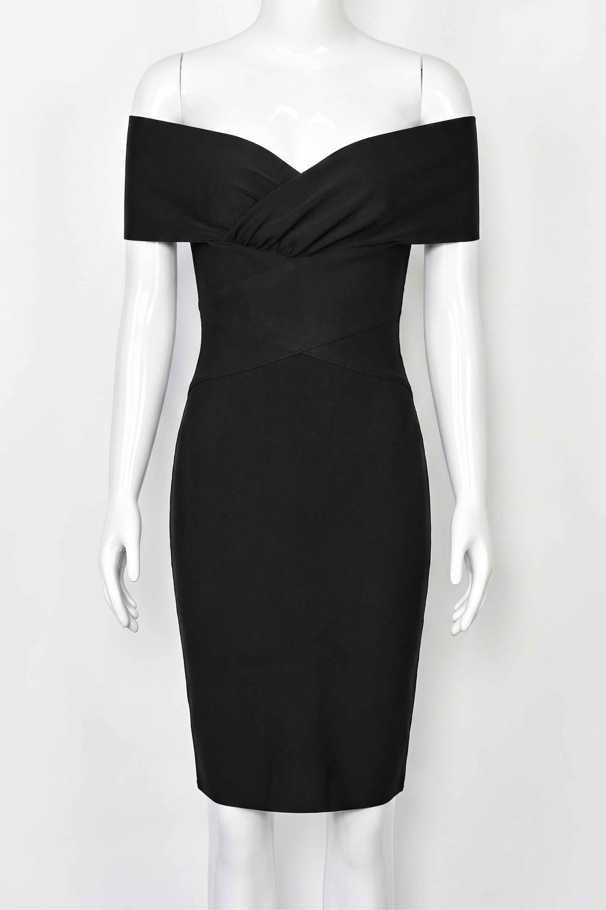 Woman wearing a figure flattering Bea Bandage Dress - Classic Black Bodycon Collection
