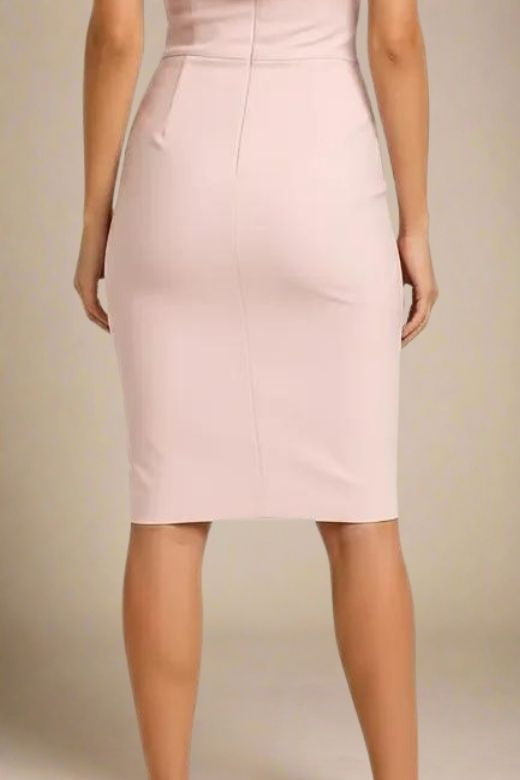 Woman wearing a figure flattering Bea Bandage Dress - Cream Bodycon Collection