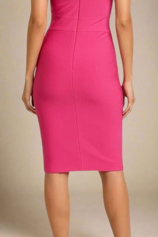 Woman wearing a figure flattering Bea Bandage Dress - Hot Pink Bodycon Collection
