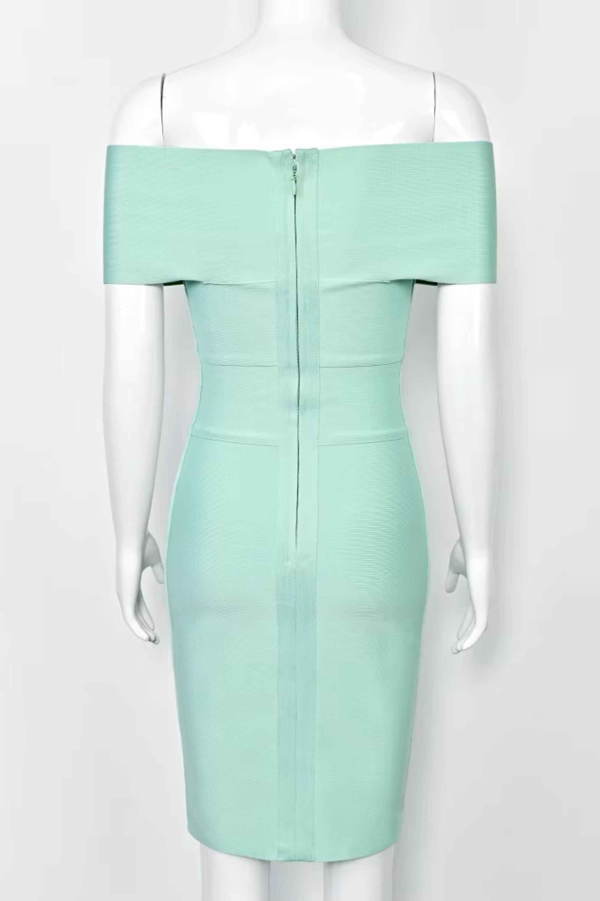 Woman wearing a figure flattering Bea Bandage Dress - Mint Green Bodycon Collection