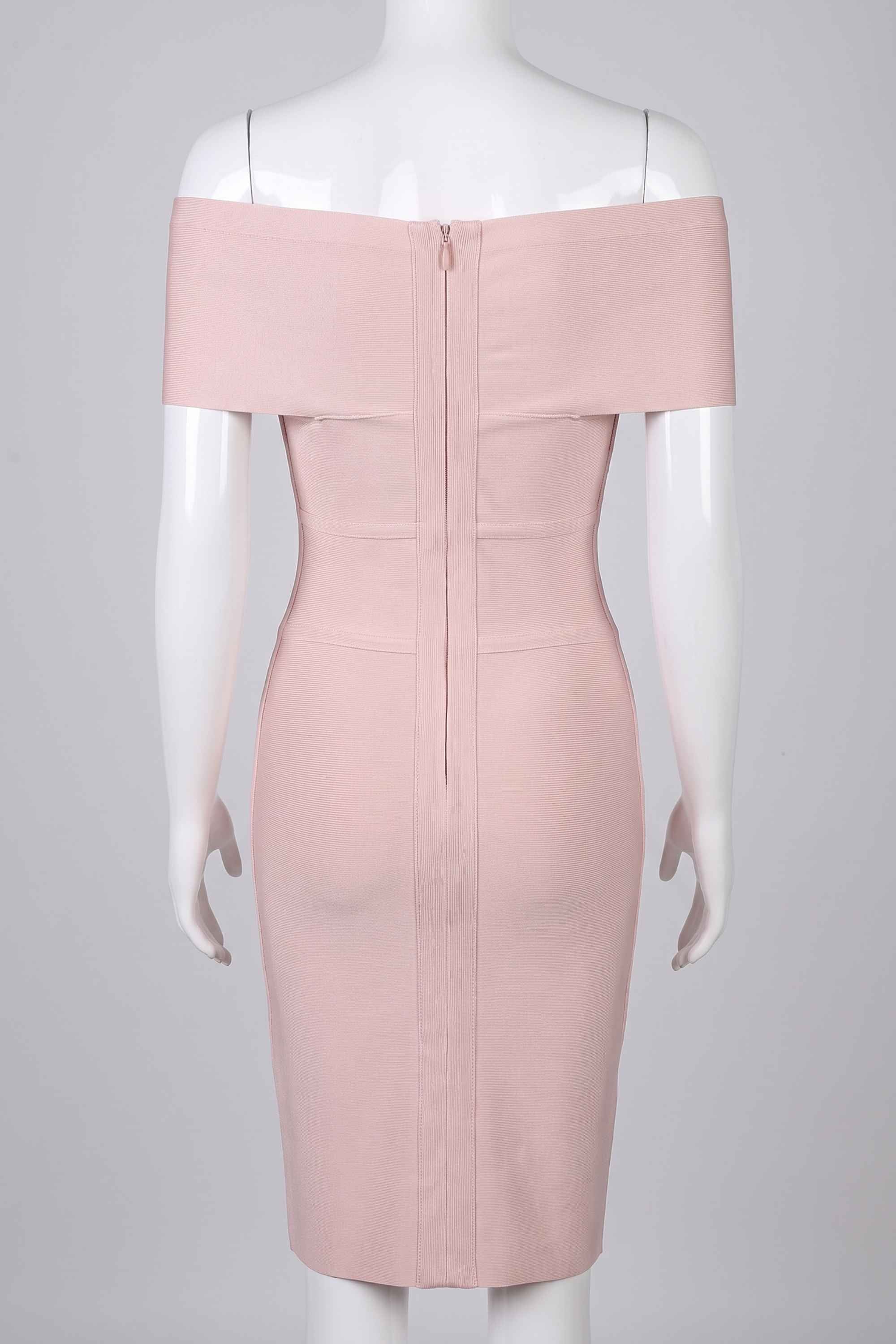 Woman wearing a figure flattering Bea Bandage Dress - Nude Bodycon Collection