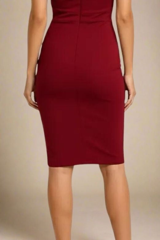 Woman wearing a figure flattering Bea Bandage Dress - Red Wine Bodycon Collection