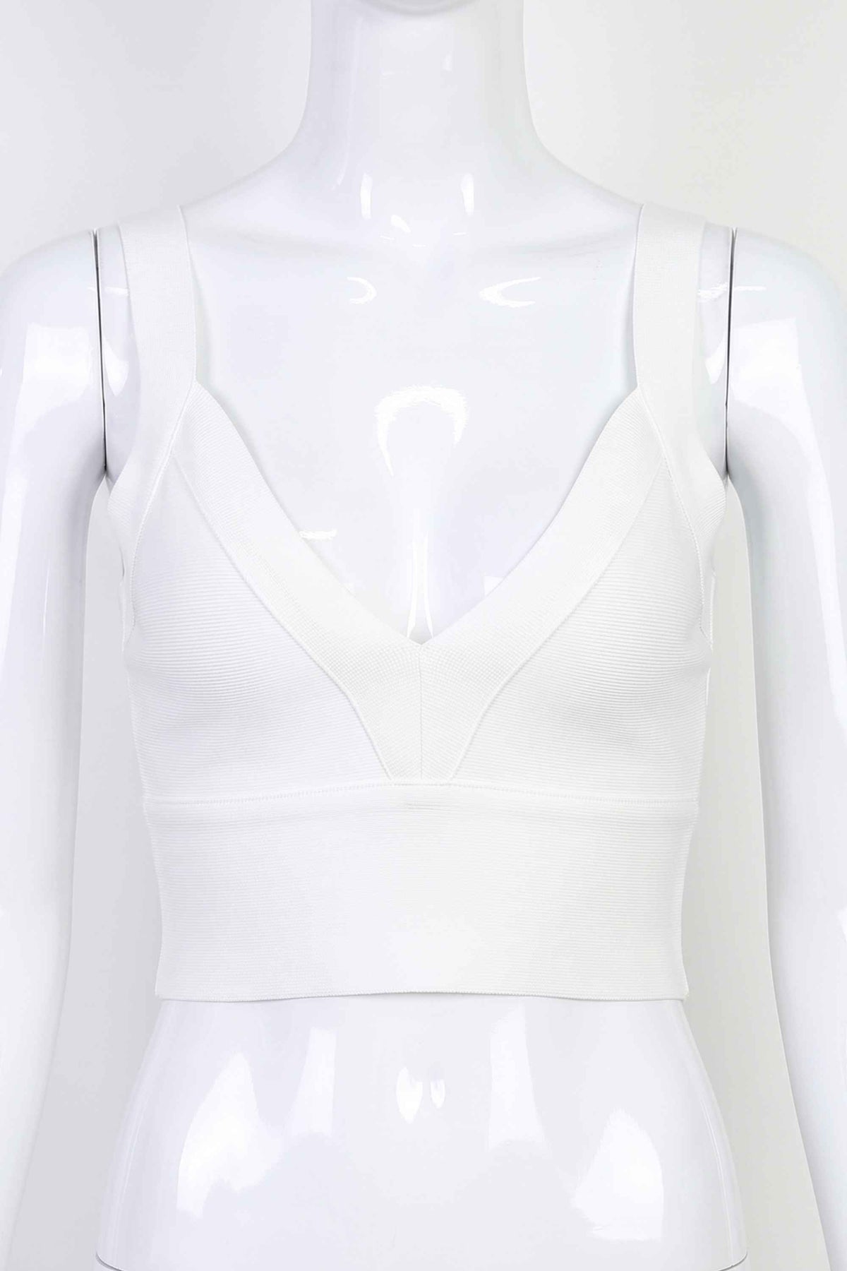 Woman wearing a figure flattering Bee Bandage Crop Top - Pearl White BODYCON COLLECTION
