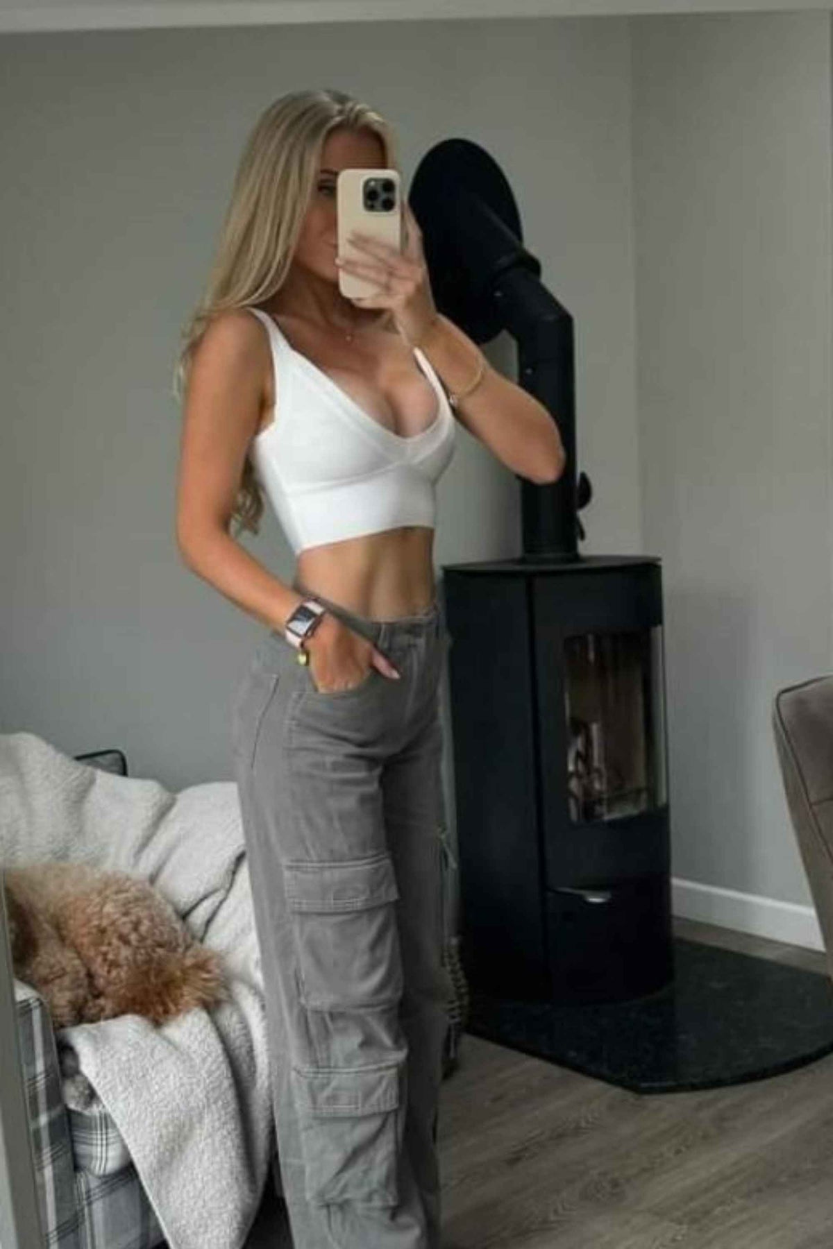 Woman wearing a figure flattering Bee Bandage Crop Top - Pearl White BODYCON COLLECTION