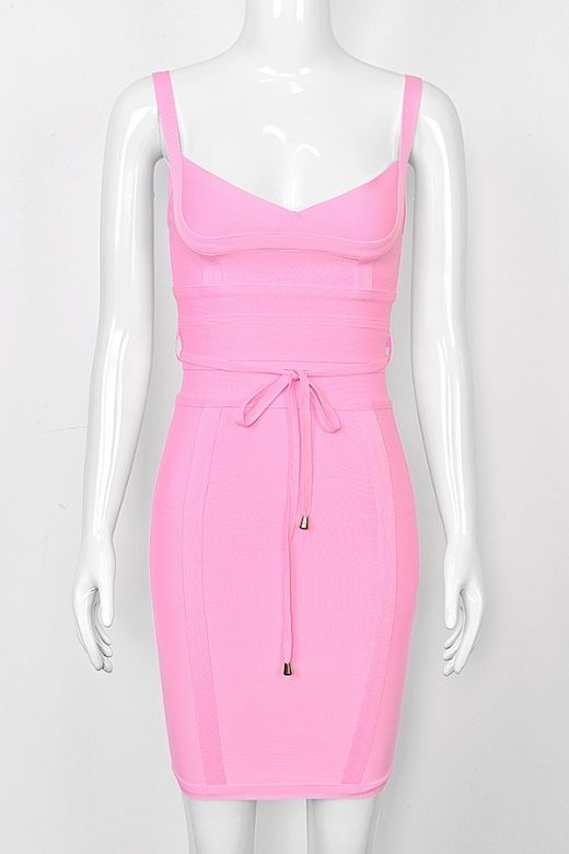 Woman wearing a figure flattering Bek Bandage Dress - Blush Pink Bodycon Collection
