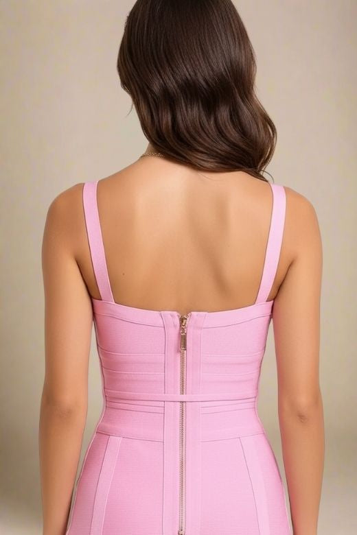 Woman wearing a figure flattering Bek Bandage Dress - Blush Pink Bodycon Collection