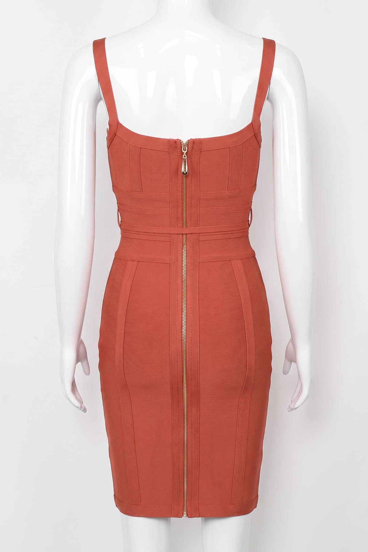 Woman wearing a figure flattering Bek Bandage Dress - Burnt Orange Bodycon Collection