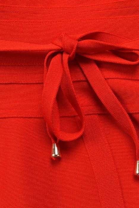 Woman wearing a figure flattering Bek Bandage Dress - Lipstick Red Bodycon Collection