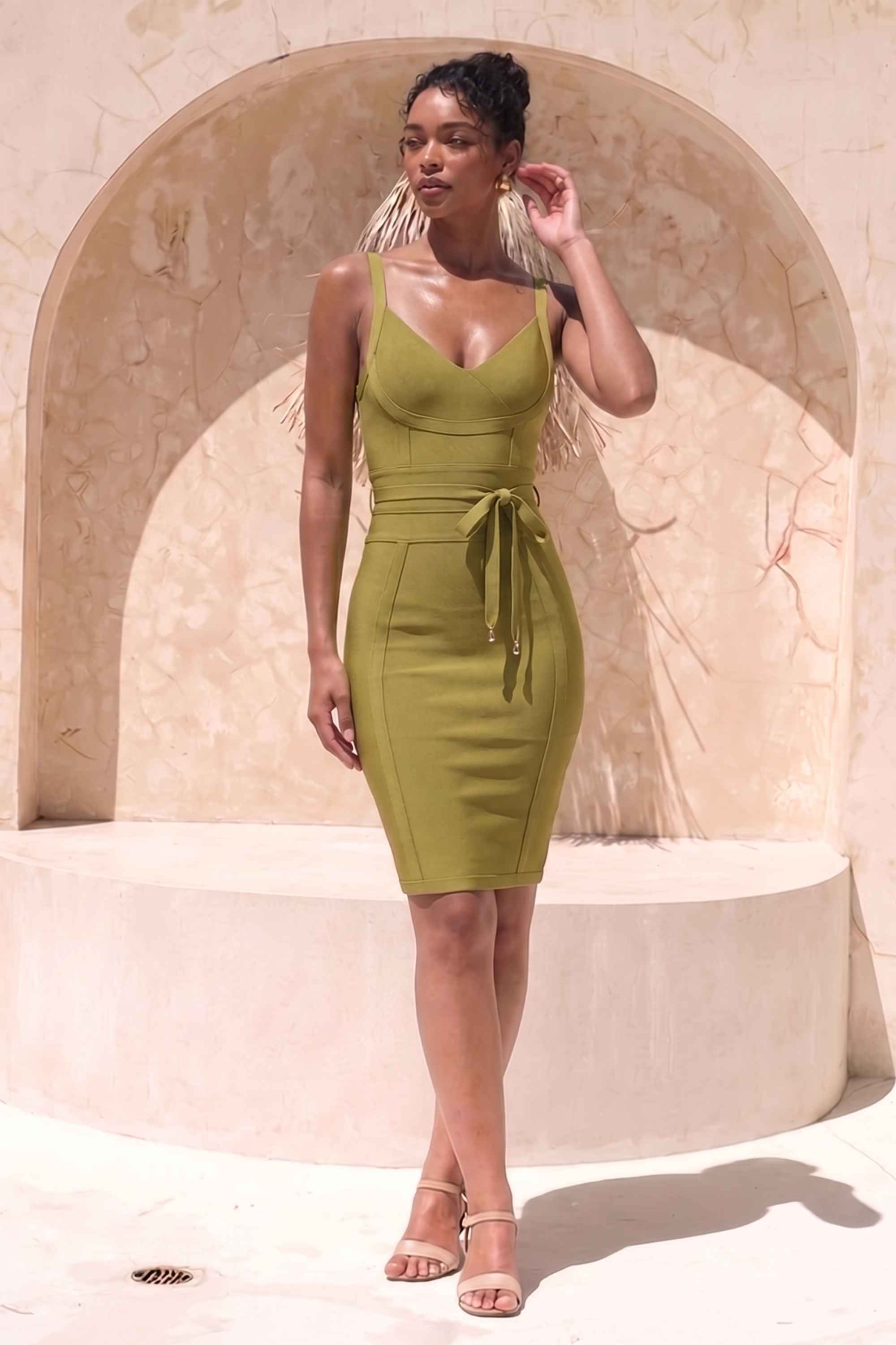 Woman wearing a figure flattering Bek Bandage Dress - Olive Green Bodycon Collection