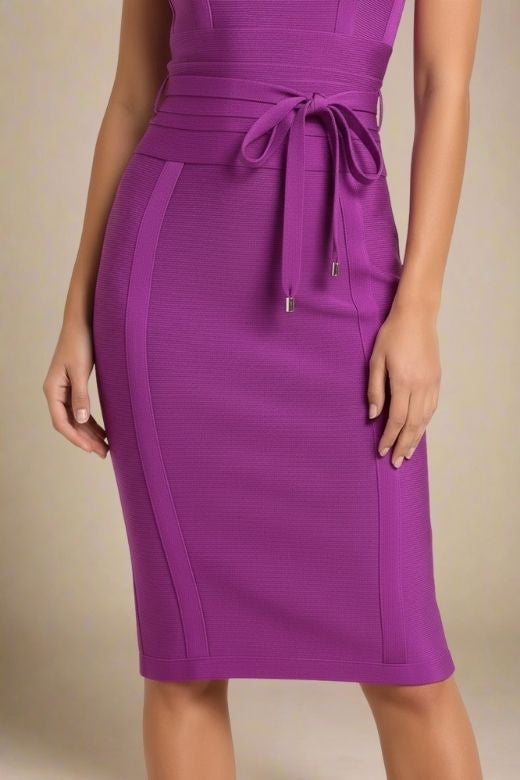 Woman wearing a figure flattering Bek Bandage Dress - Plum Purple Bodycon Collection