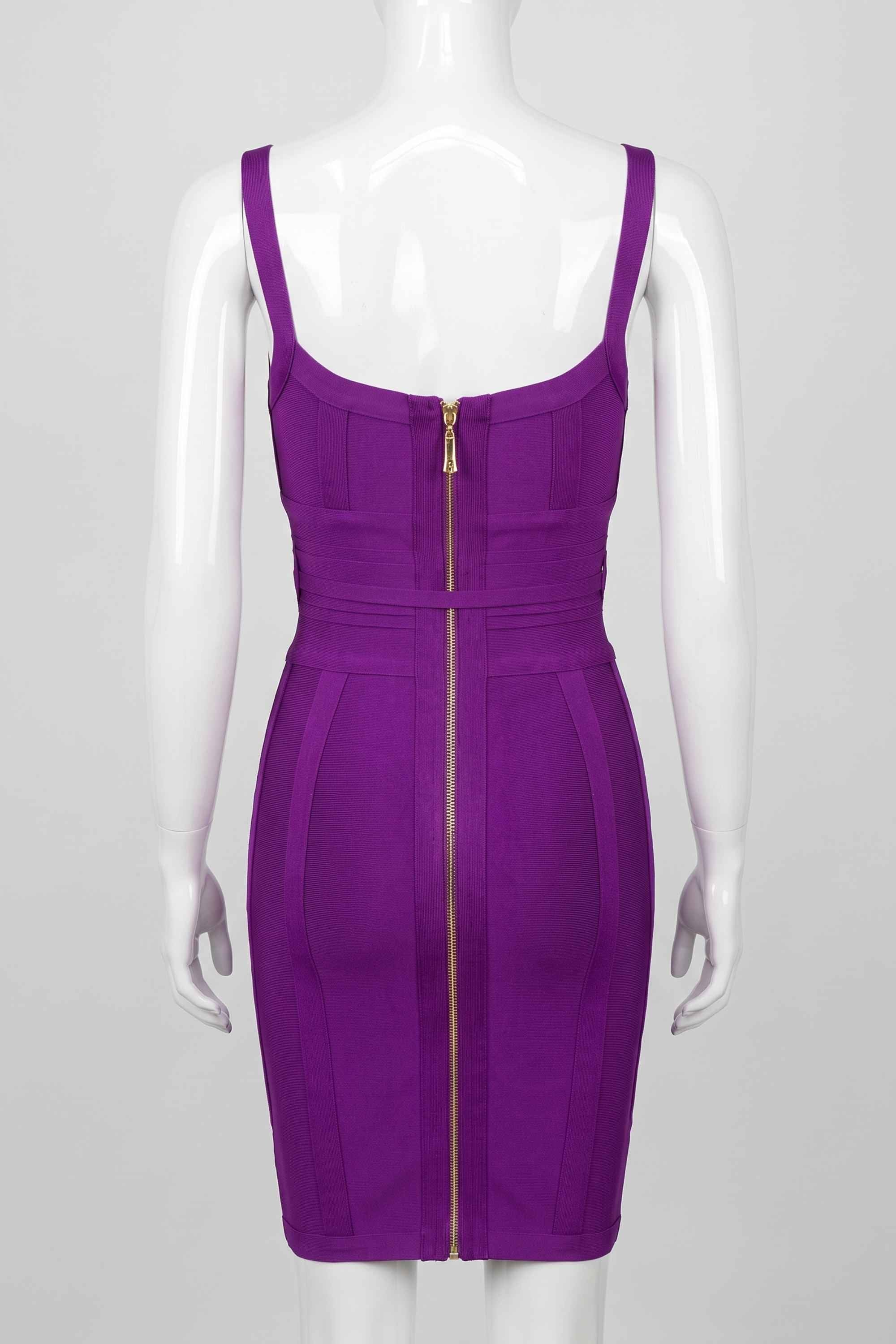 Woman wearing a figure flattering Bek Bandage Dress - Plum Purple Bodycon Collection