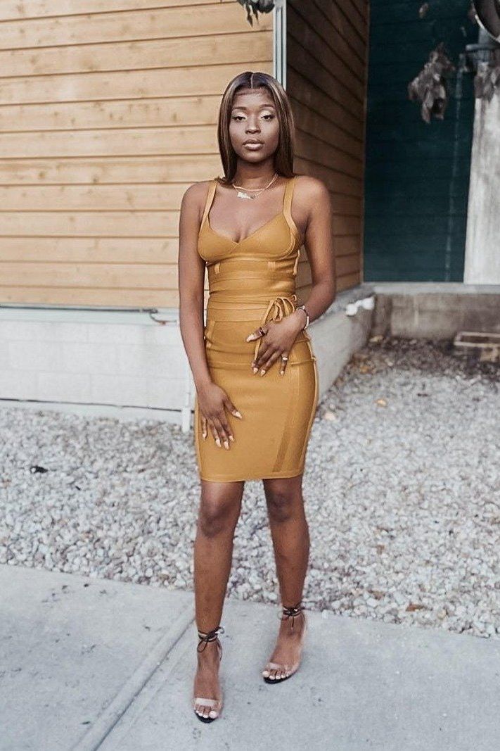 Woman wearing a figure flattering Bek Bandage Dress - Plum Purple Bodycon Collection