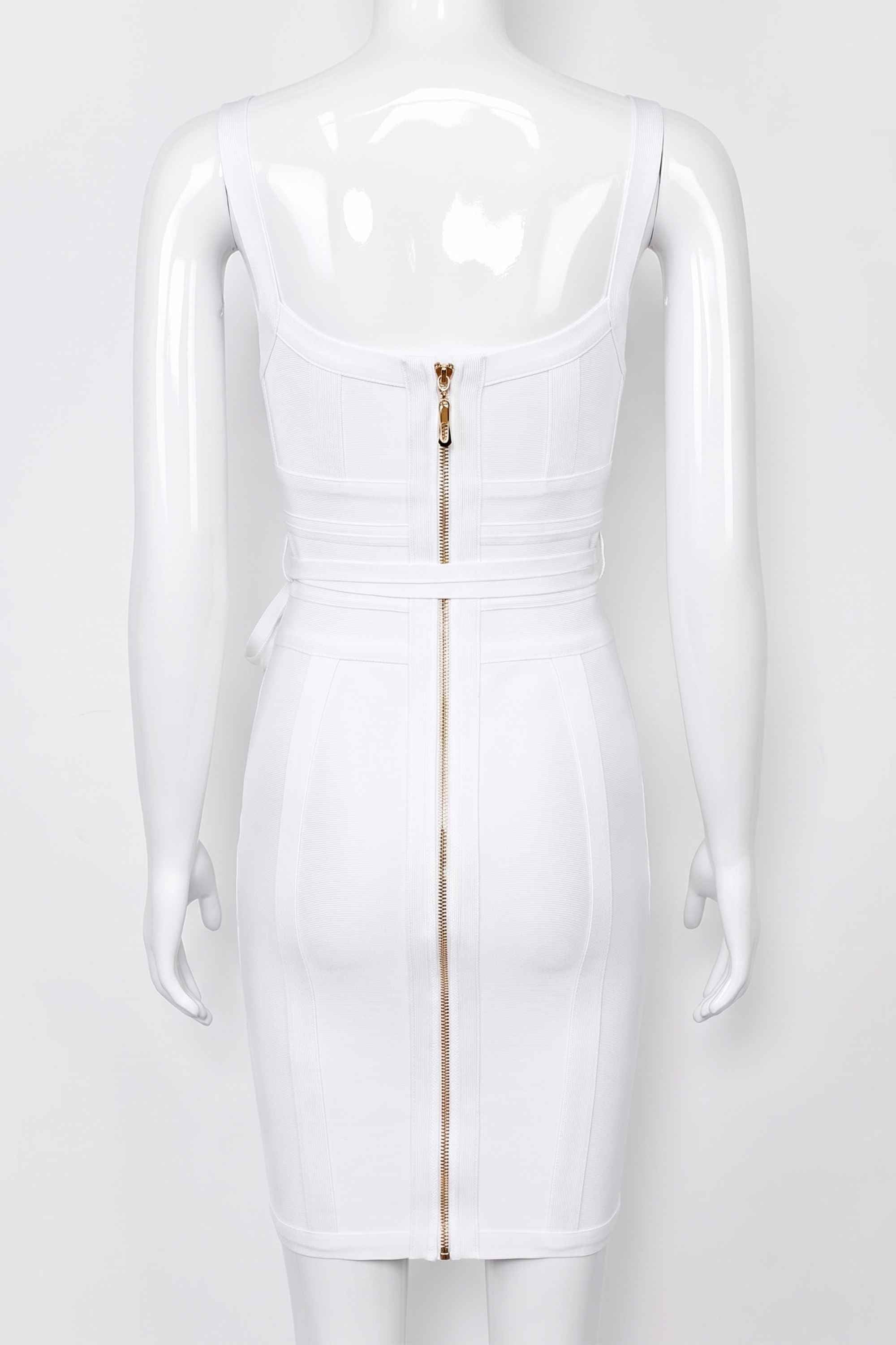 Woman wearing a figure flattering Bek Bandage Dress - White Pearl Bodycon Collection