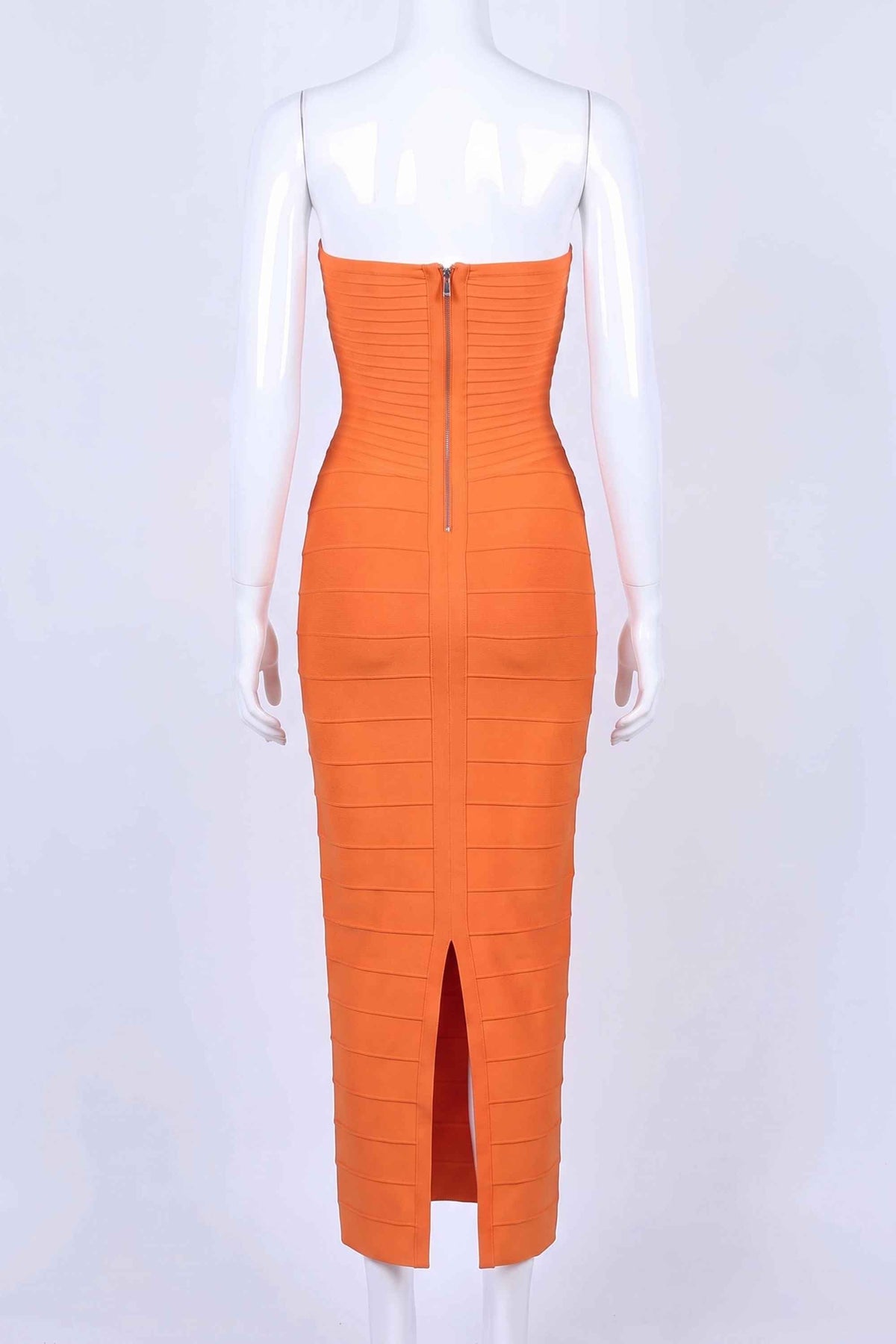 Woman wearing a figure flattering Belle Bandage Maxi Dress - Apricot Orange BODYCON COLLECTION Pty Ltd