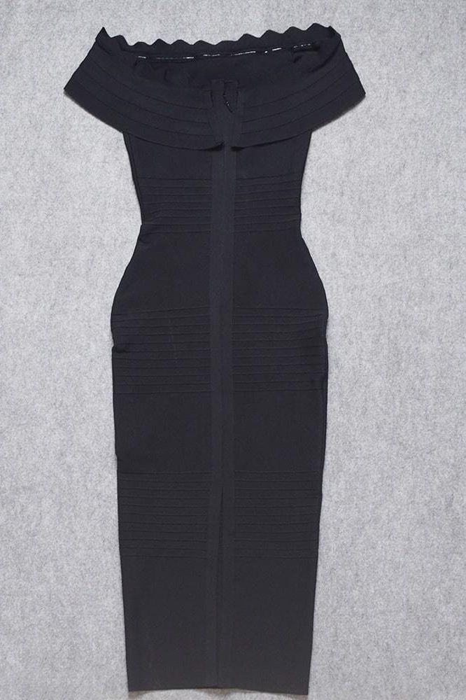 Woman wearing a figure flattering Billie Bandage Midi Dress - Classic Black Bodycon Collection