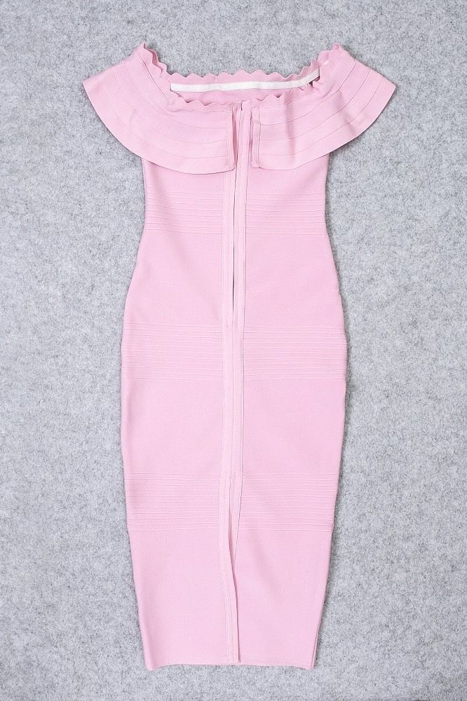 Woman wearing a figure flattering Billie Bandage Midi Dress - Dusty Pink Bodycon Collection