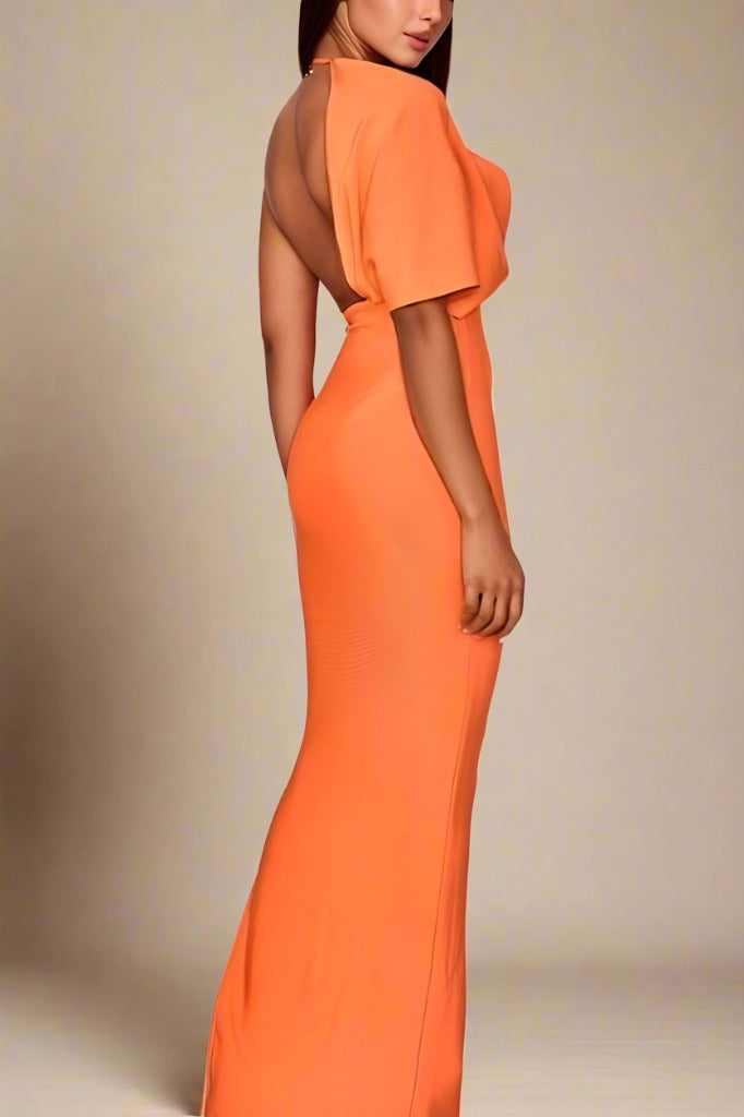 Woman wearing a figure flattering Blake Bandage Maxi Dress - Apricot Orange BODYCON COLLECTION