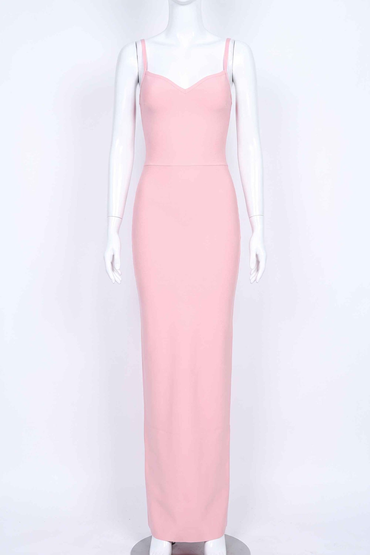Woman wearing a figure flattering Blanche Bandage Maxi Dress - Dusty Pink BODYCON COLLECTION