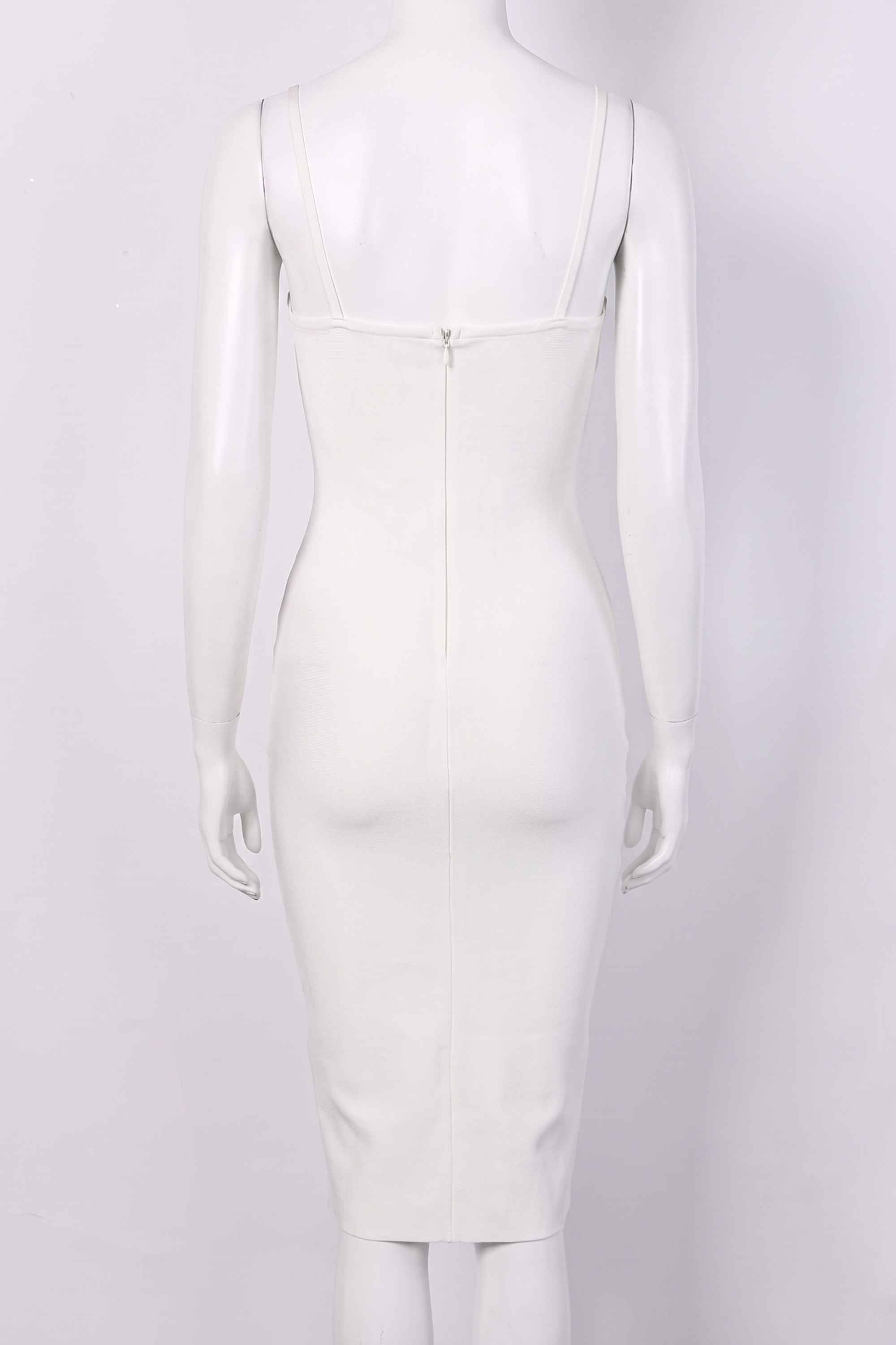 Woman wearing a figure flattering Blanche Bandage Midi Dress - Pearl White BODYCON COLLECTION