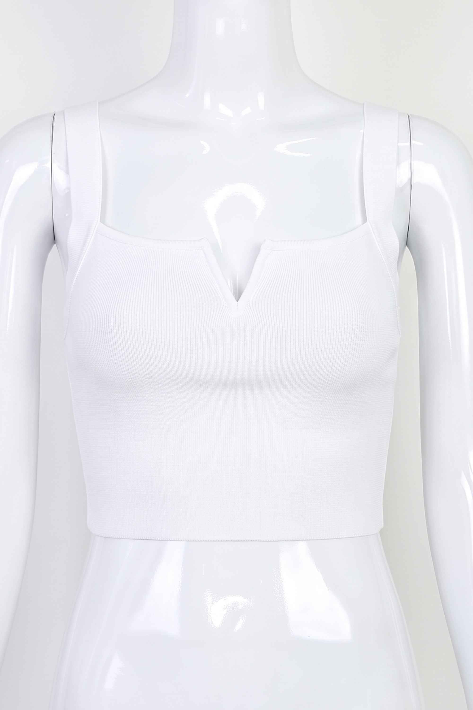 Woman wearing a figure flattering Brooke Bandage Crop Top - Pearl White BODYCON COLLECTION