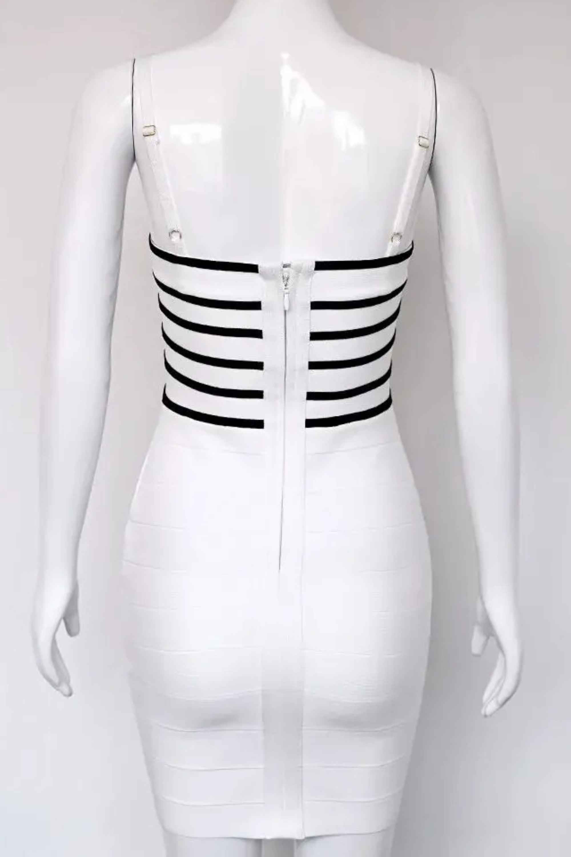 Woman wearing a figure flattering Carter Bandage Mini Dress - Pearl White BODYCON COLLECTION