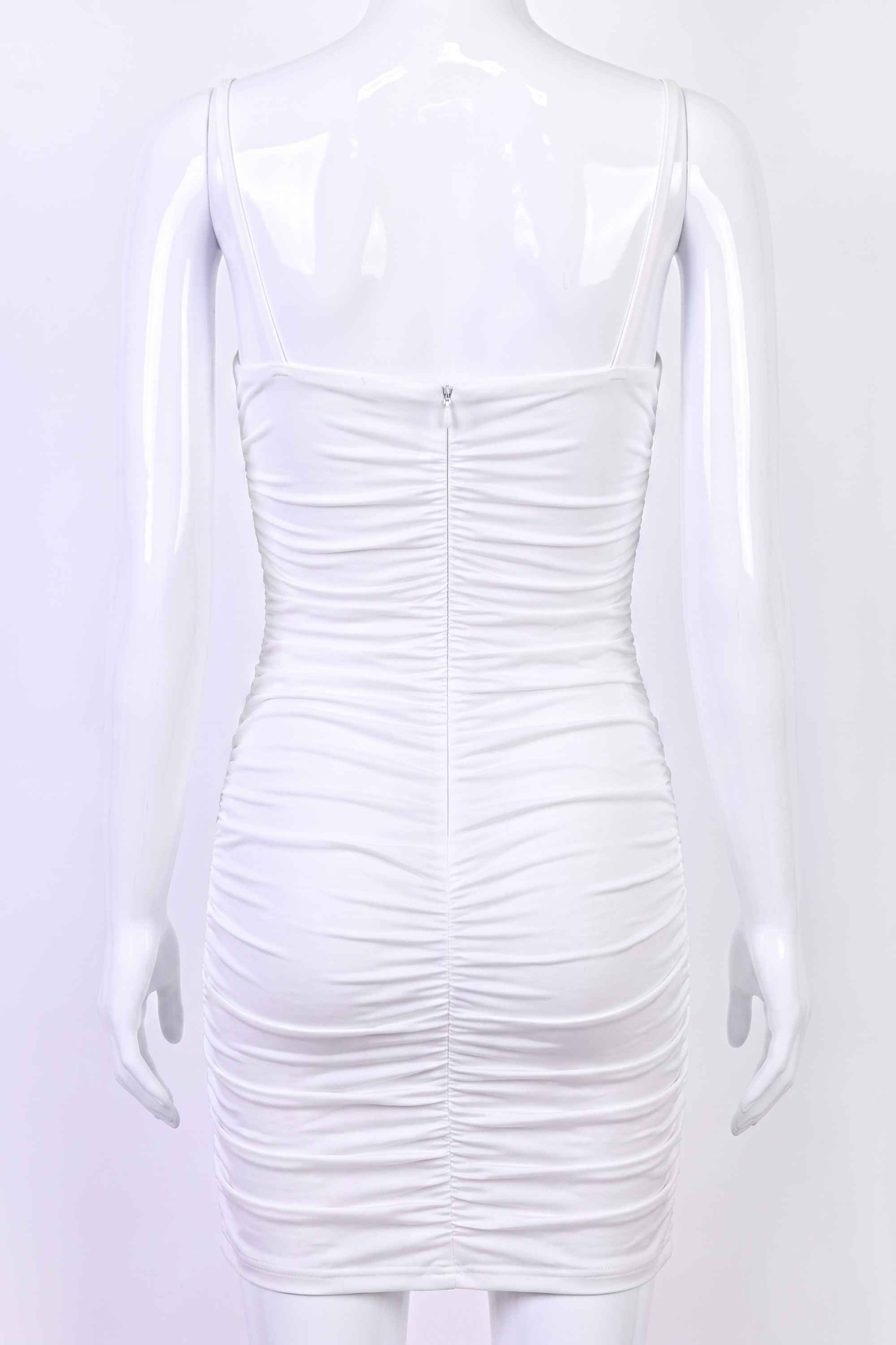 Woman wearing a figure flattering Cassie Bodycon Wrap Mini Dress - Pearl White BODYCON COLLECTION