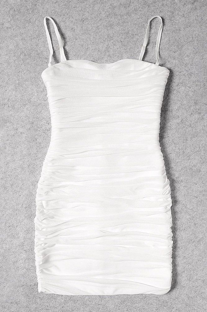Woman wearing a figure flattering Cassie Bodycon Wrap Mini Dress - Pearl White BODYCON COLLECTION