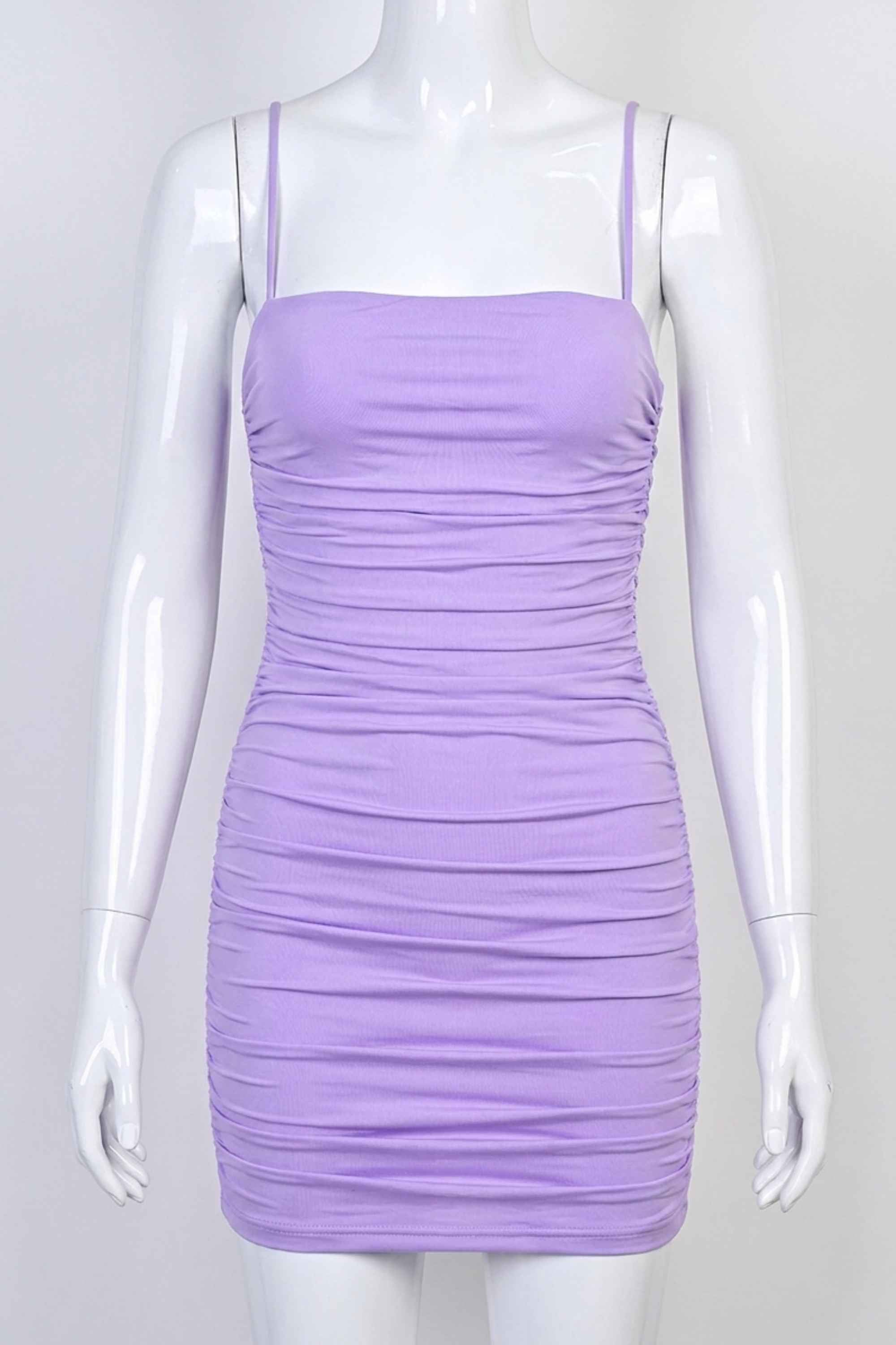 Woman wearing a figure flattering Cassie Bodycon Wrap Mini Dress - Violet BODYCON COLLECTION