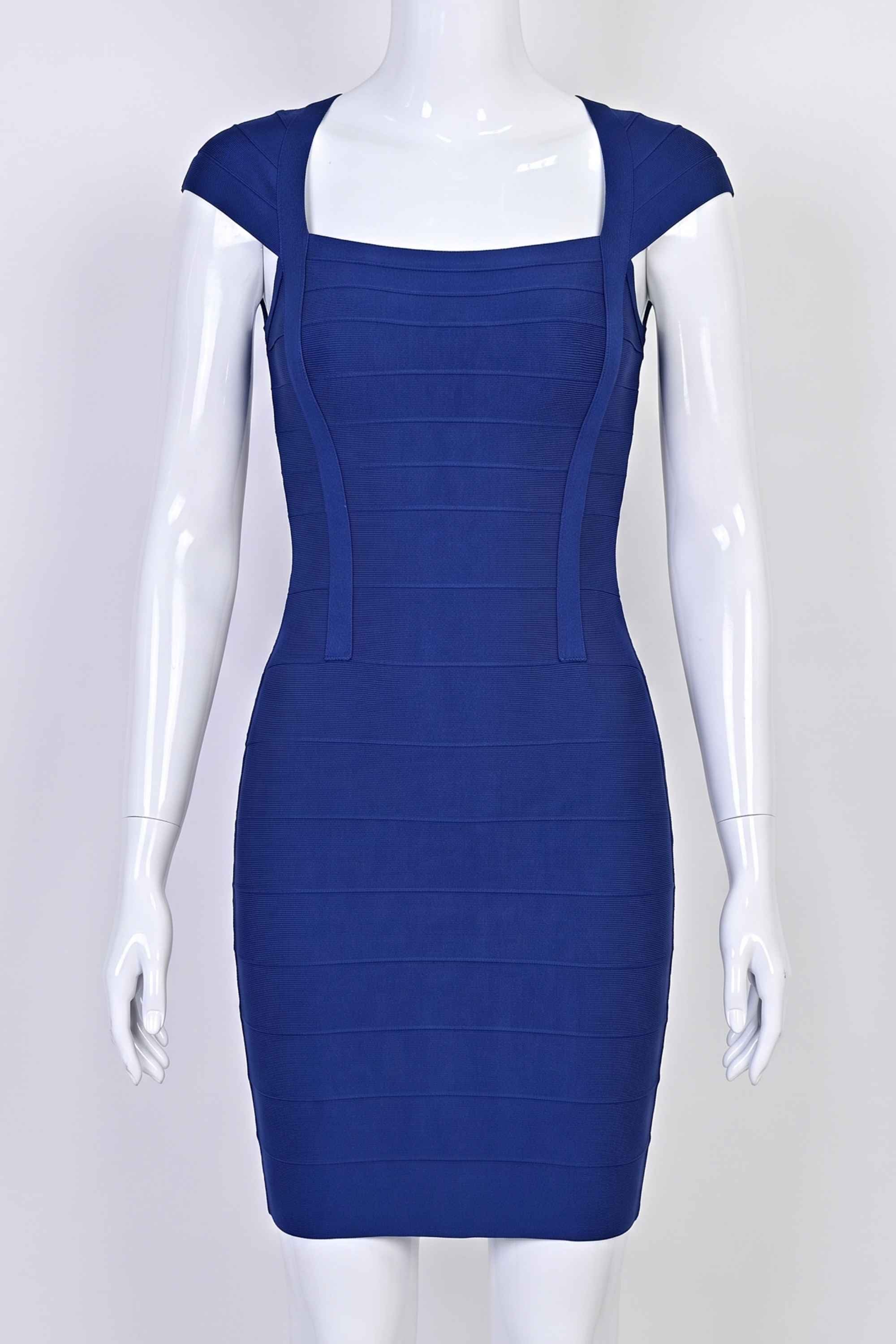 Woman wearing a figure flattering Celine Bandage Mini Dress - Navy Blue BODYCON COLLECTION Pty Ltd
