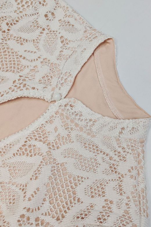 Woman wearing a figure flattering Charlotte Long Sleeve Bodycon Mini Dress - Cream BODYCON COLLECTION