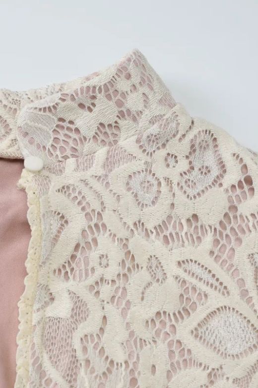 Woman wearing a figure flattering Charlotte Long Sleeve Bodycon Mini Dress - Cream BODYCON COLLECTION