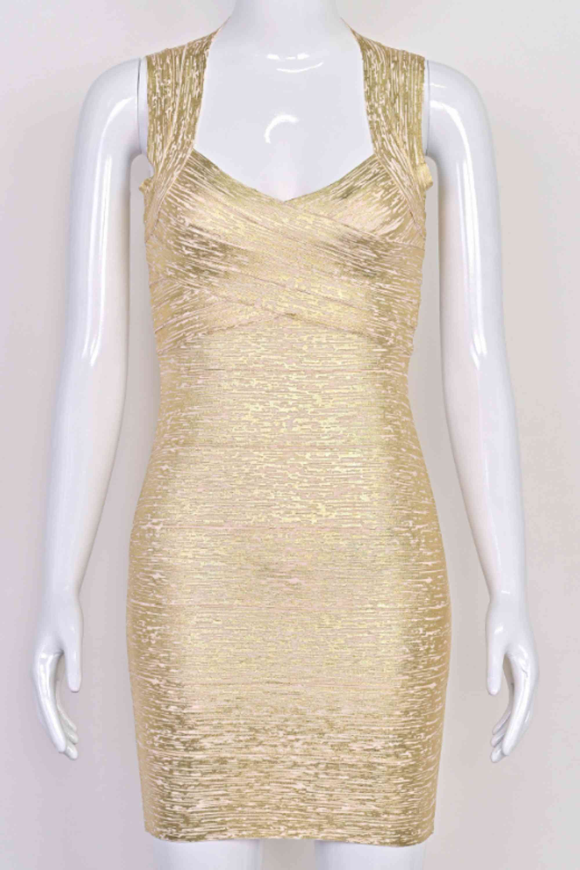 Woman wearing a figure flattering Ciara Bandage Mini Dress - Gold BODYCON COLLECTION